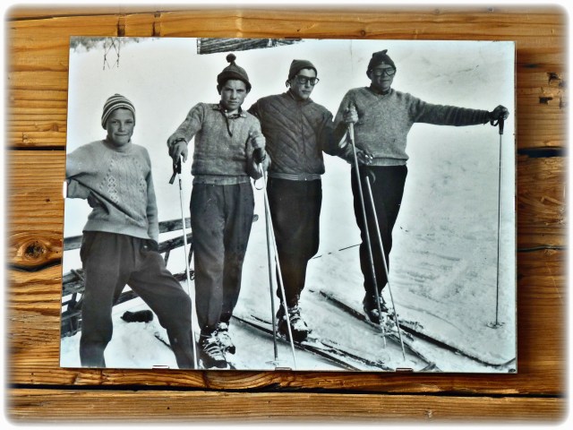 Ski characters from the past on the walls of the rifugio.