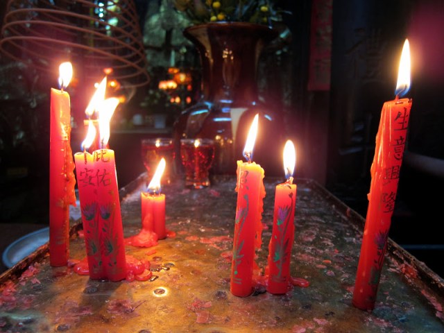 Candles lit inside the temple