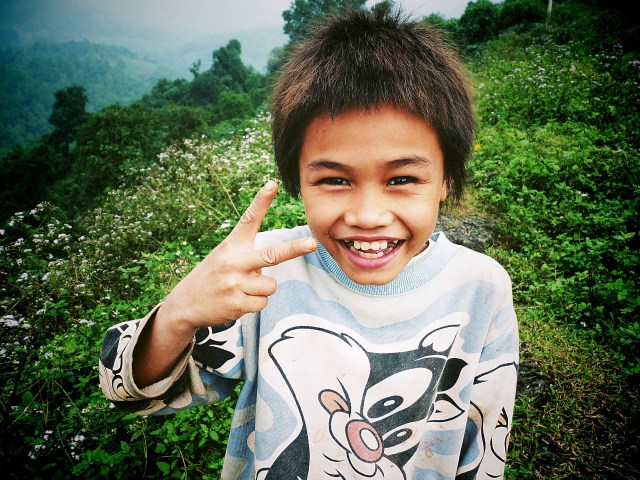 Vietnamese boy from the minority Van Kieu hill peoples near Laos