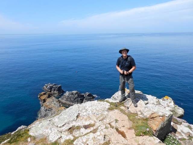 Looking suitably adventurous against the backdrop of blue seas and rocky clifftops along the way