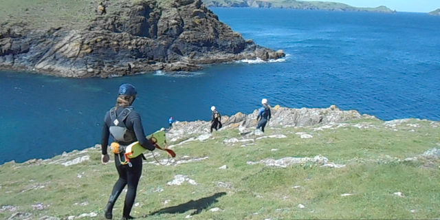 Taking the route down to the cliffs for a spot of Coasteering